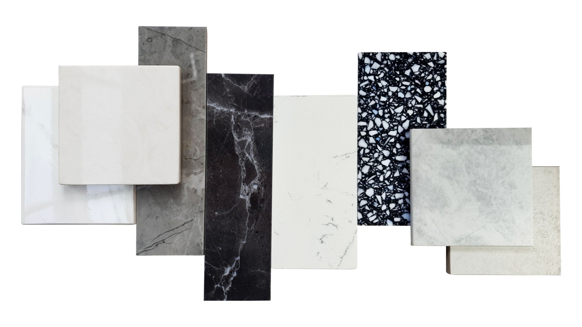 close up of interior premium stone  samples including black marble, grey artificial stone, terrazzo tiles placed with floor tiles. counter top samples isolated on background with clipping path.